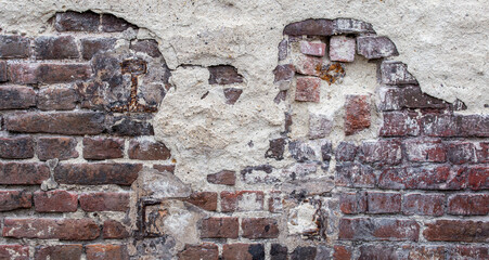 background of old red brick wall. Texture of grunge brickwork