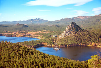 Majestic nature of Kazakhstan concept: epic view of Burabay lake with Zhumbaktas rock at sunrise in...