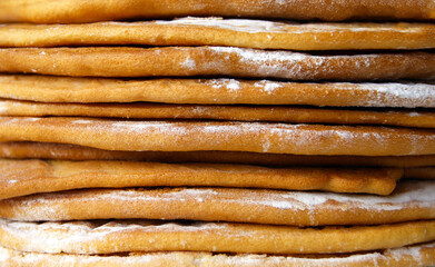 Stacked round baked cake layers. Homemade cooking honey cake.