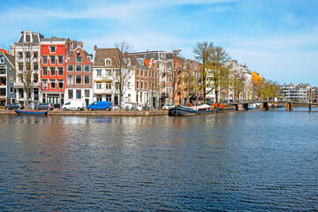 Medieval houses along the river Amstel in Amsterdam the Netherlands