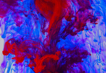 red and blue ink in water