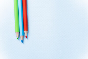 colored pencils on white background