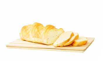 
Sliced ​​loaf on wood board isolated on white background