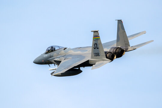 LEEUWARDEN, NETHERLANDS - APR 5, 2017: US Air Force F-15 Eagle fighter jet airplane taking off during exercise Frisian Flag.