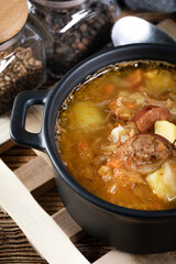 Traditional russian sour cabbage soup
