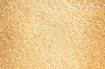 Light brown fibrous kraft paper texture close up