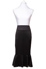Woman clothes isolated. Closeup of elegant beautiful black summer skirt on a mannequin isolated on...