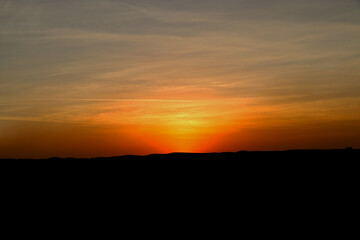 Fototapeta na wymiar Sunset in red sand 