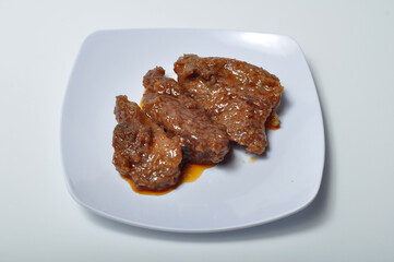 Rendang, an Indonesian spicy meat dish originating from the Minangkabau region in West Sumatra