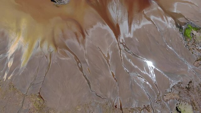 Aerial Flyby view on the islands at Lake Natron in the Great Rift Valley, between Kenya and Tanzania. In the dry season the lake is 80% covered by soda and is known for its wading birds and huge