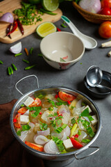 Braised beef clear with meat tendon soup stew, Thai food.