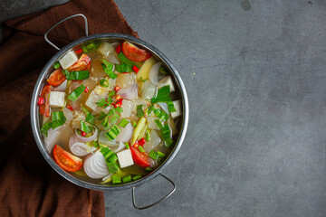 Braised beef clear with meat tendon soup stew, Thai food.