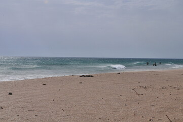 Fototapeta na wymiar Enjoying big waves at the Playa El Palmar, Cádiz in July 2020, Andalusia