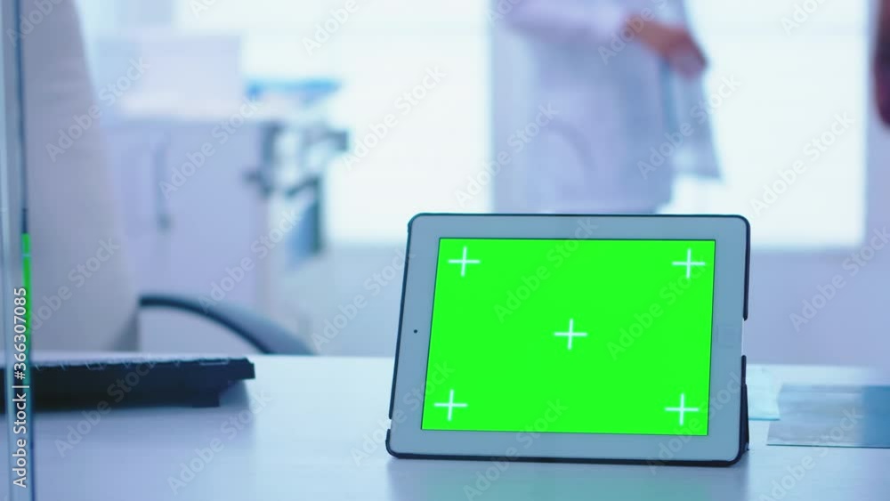 Aufkleber tablet computer with copy space available in doctor cabinet. assistant holding x-ray image. view of 