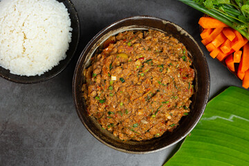 Ong Chili on a black board background