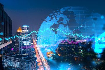 FOREX graph hologram, aerial night panoramic cityscape of Bangkok, the developed location for stock market researchers in Asia. The concept of fundamental analysis. Double exposure.