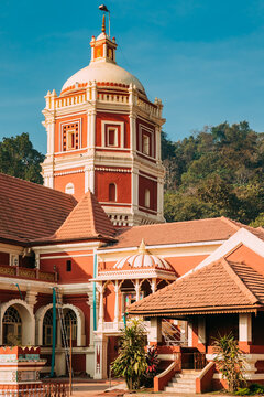 Kavlem, Phonda, Goa, India. Shree Shantadurga Mandir, Kavlem Temple. Famous Landmark And Popular Destination. White Lamp Tower. Shantadurga Devi