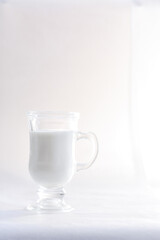 Glass of milk in natural light