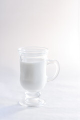 Glass of milk in natural light