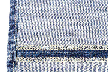 Piece of blue jeans fabric