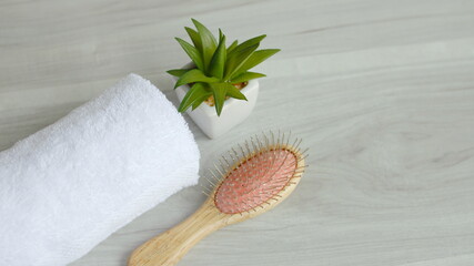 Beautiful spa composition on massage table , spa relax concept, copy space, beautiful spa set on wood table