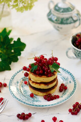 pancakes with red currant..style  .selective focus