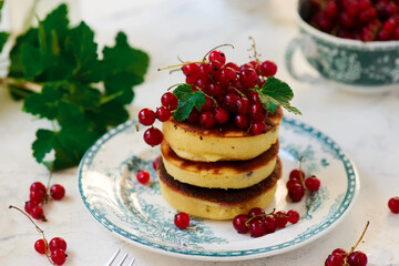 pancakes with red currant..style  .selective focus