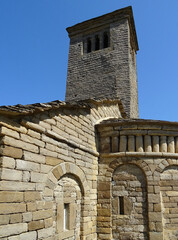 View of the bell tower and apse of the Mozarab Pre-Romanesque or Romanesque Church of San Pedro de Larrede in the Serrablo Region. 10th-11th century. Aragon. Spain.