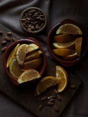 Rustic simple oranges and almonds with vintage pocket knife.