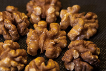 Walnuts on a black background