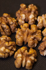 Walnuts on a black background