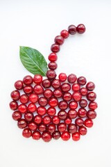 Red cherry ripe juicy on a white background.