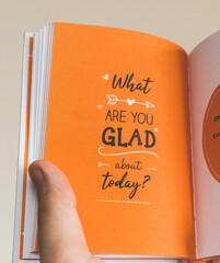 Motivational quote in the book with an orange background
