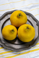 Group of ripe yellow quince apples