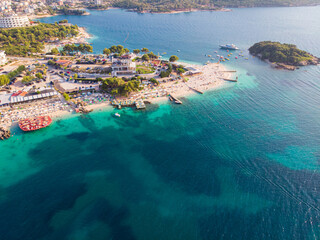 Aerial view of the coastline of the resort town of Ksamil on a sunny summer day. Albania.