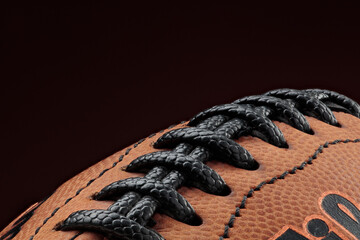 The ball in American football on a brown background. Super bowl. American Football Laces