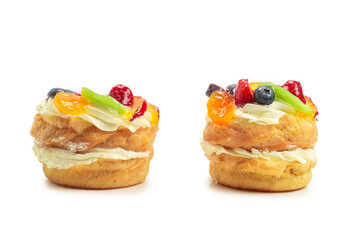 Home made cake with cream and fruit isolated