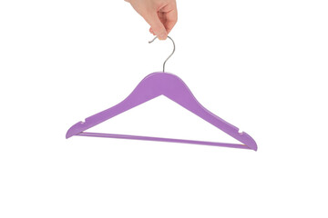 Purple hanger in woman hand isolated.