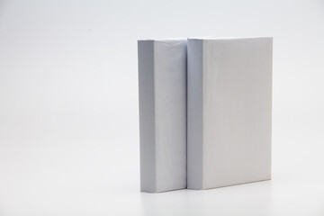 Stand blank white books on white background