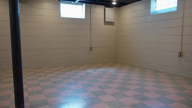 Wide shot of Basement with Asbestos Vinyl Flooring from the 50's and 60's