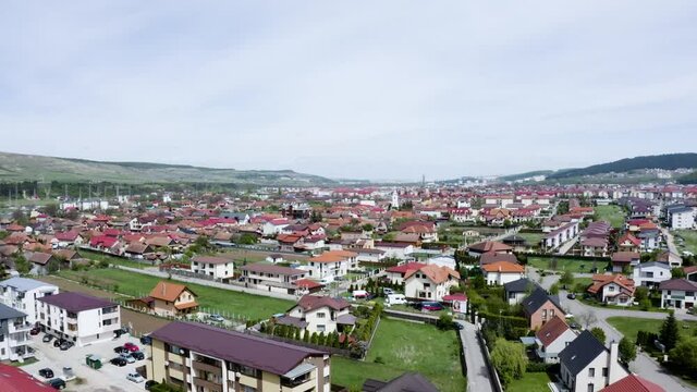 Aerial shot of a small town on the outskirts of Cluj, Romania. Gilau