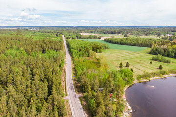 Obraz premium Aerial panoramic view of road in Kouvola near the river Kymijoki, Finland.