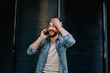 Wondered bearded hipster guy recall important information during phone conversation with friend on...