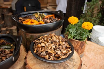 Typical Colombian food served in clay pots