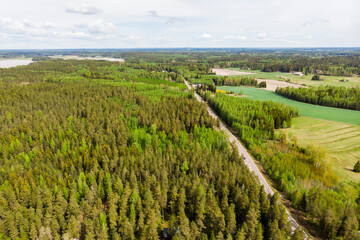 Fototapeta na wymiar Aerial panoramic view of road in Kouvola near the river Kymijoki, Finland.