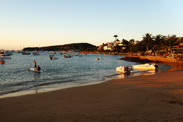 People enjoying sunset at Buzios beach, Brasil