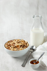 glass of milk and oatmeal pancakes
