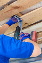 Fototapeta premium Professional worker install garage doors at new house