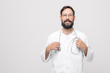 close-up portrait of young male doctor in uniform with stethoscope. medical concept