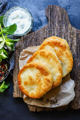 wrap flat bread tortillas from flour and water home cooking Takeaway handmade langos food background top view copy space